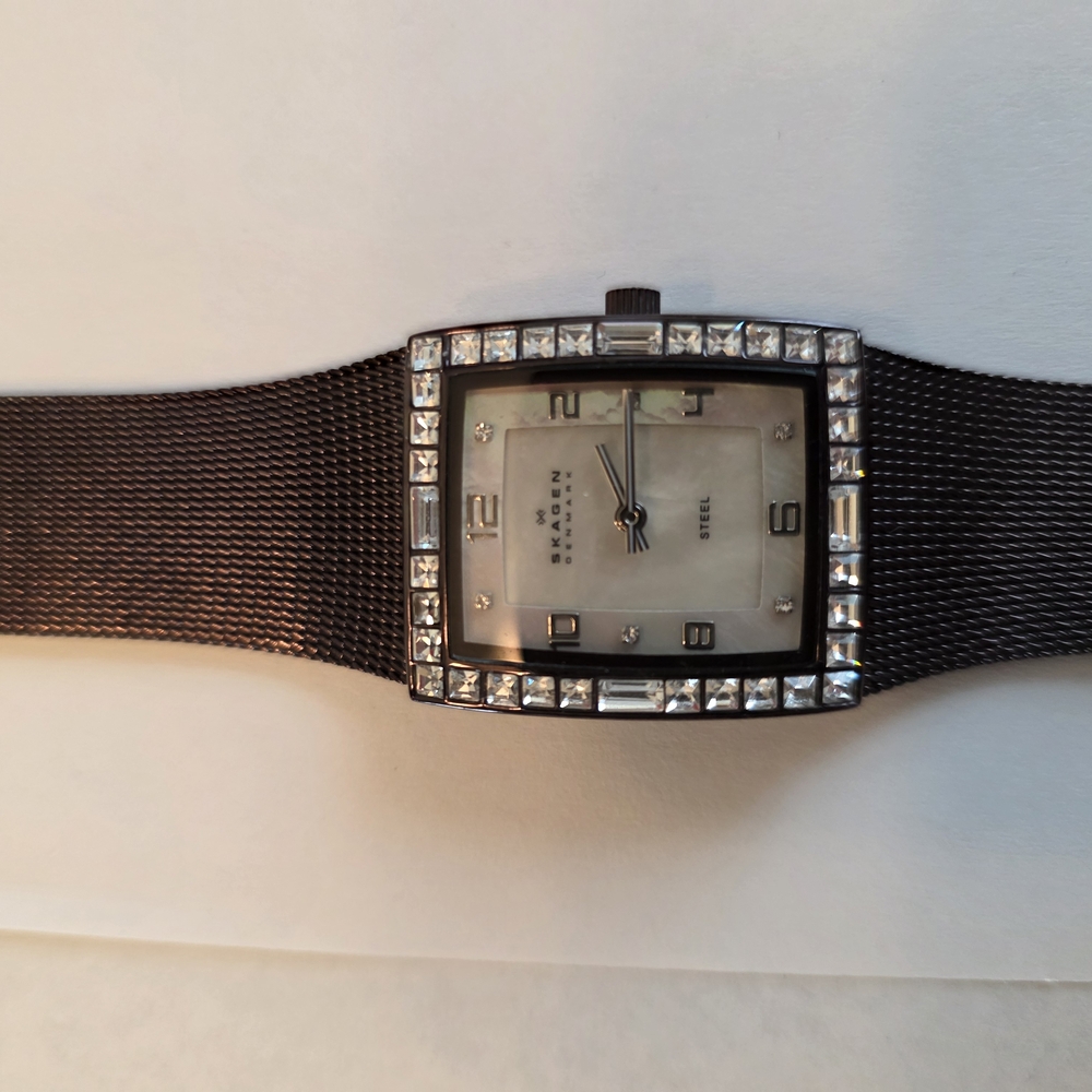 Elegant Silver and Black Watch with Crystal Accents
